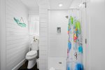 Jack-and-Jill guest bathroom with walk-shower